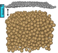 Atomic-level view of a graphene layer above a liquid copper catalyst.